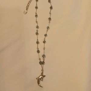 Cool Jewels - Dolphin charm necklace with light blue stones.